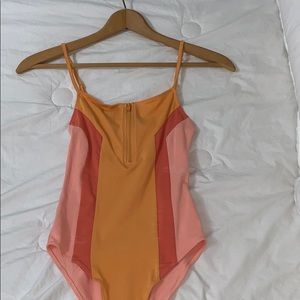 neon bodysuit ( never worn )